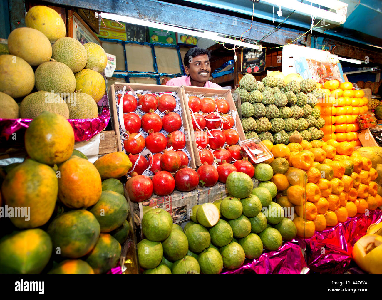 Smiling stall holder at Russell Market fruit and Vegetable Market