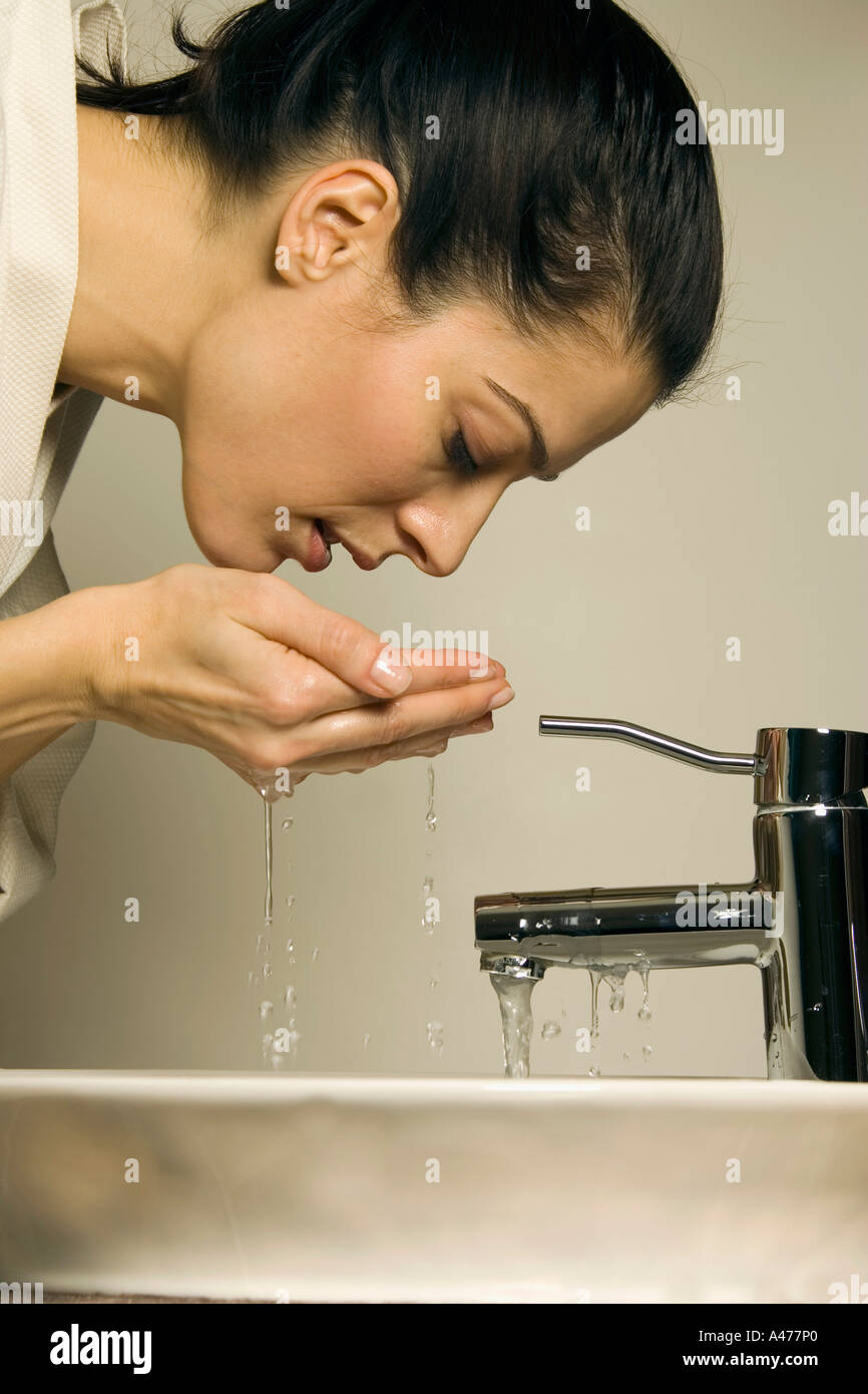 Beautiful woman face wash hi-res stock photography and images - Alamy