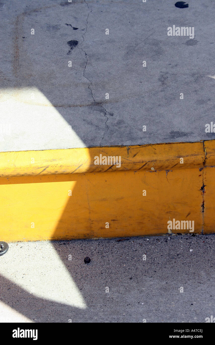 Street Curb Painted Yellow Stock Photo