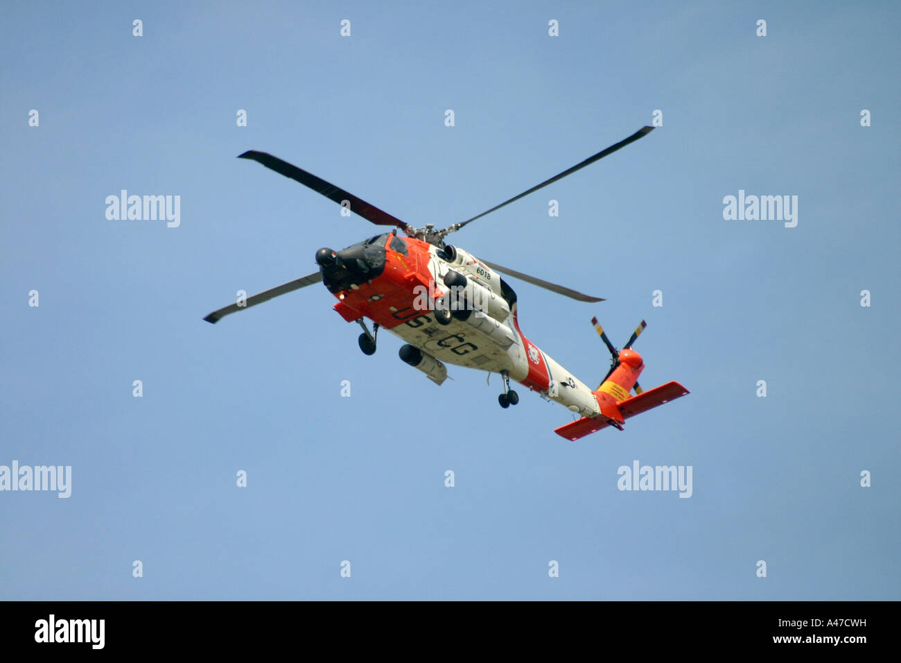 View from Below of United States Coast Guard Helicopter Stock Photo