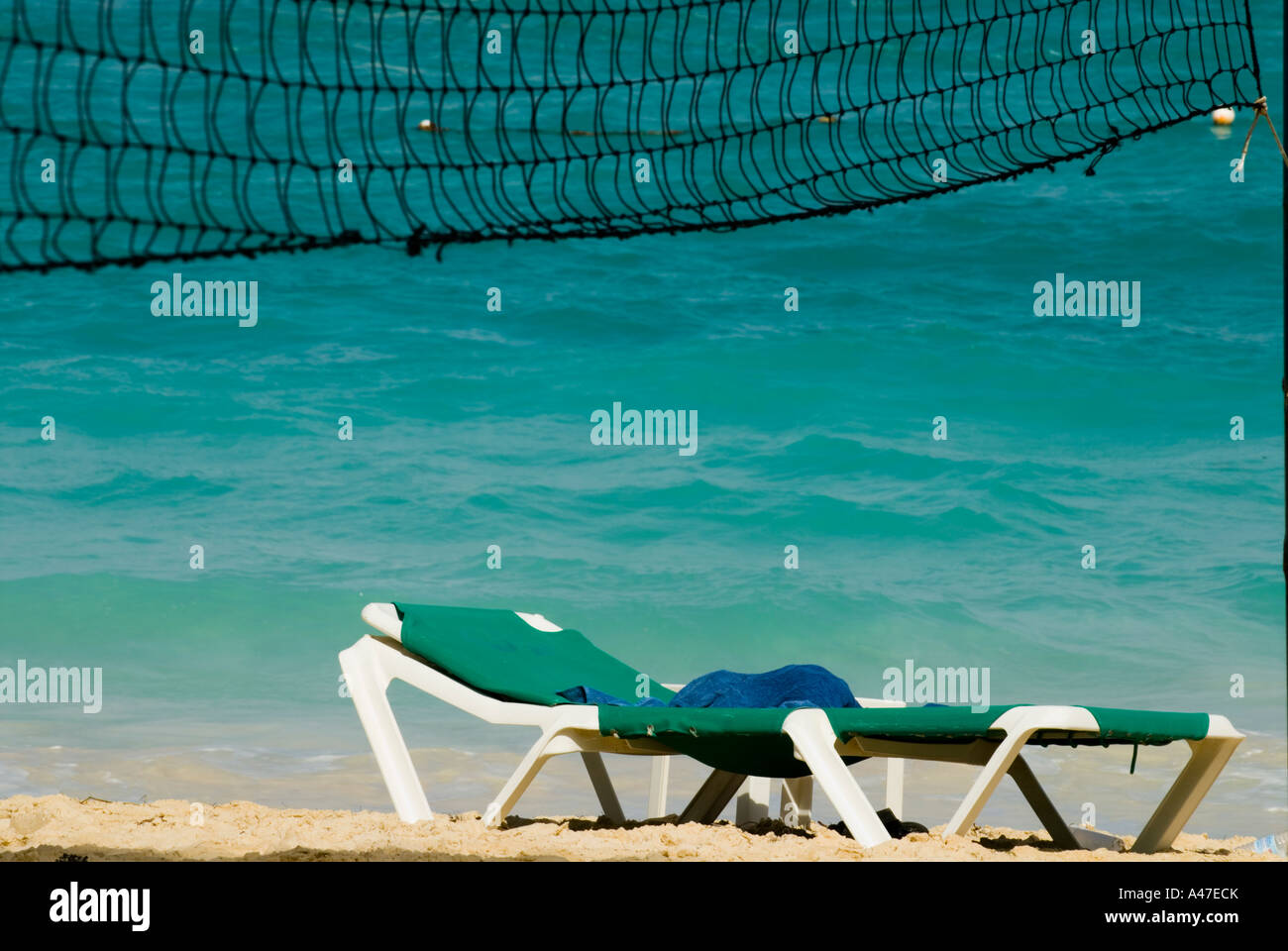 Lounge chair underneath volleyball net, Bavaro Beach, Dominican