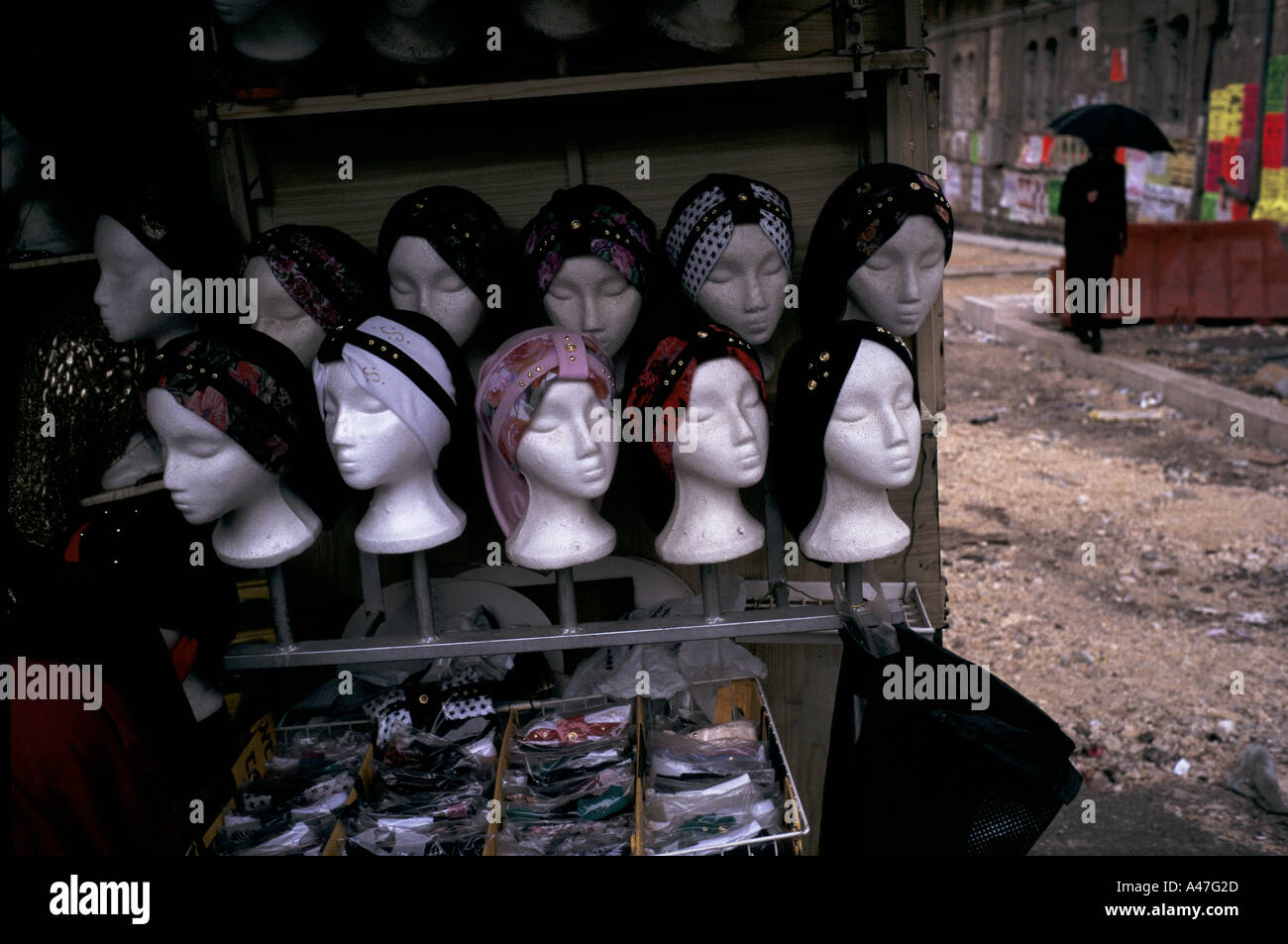 women wigs and scarves for sale on a market stall in the street in the ultra orthodox ghetto of Meir Sharim Jerusalem Israel Stock Photo