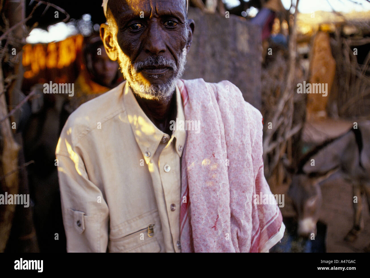 An old poor peasant man in the village of eg self declared independent country of Somaliland Stock Photo
