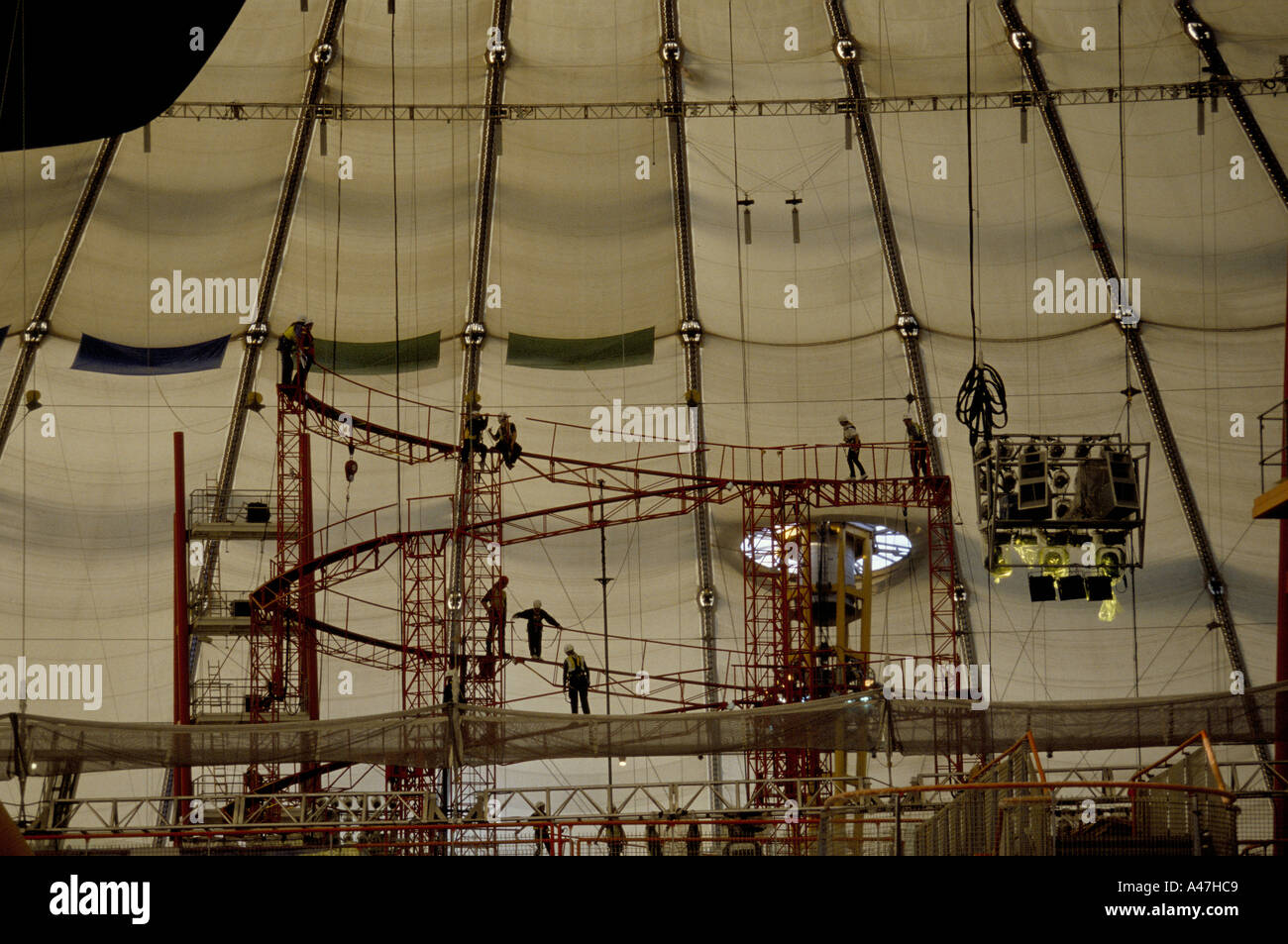 workers rigging scaffolding performance tower inside the millennium ...