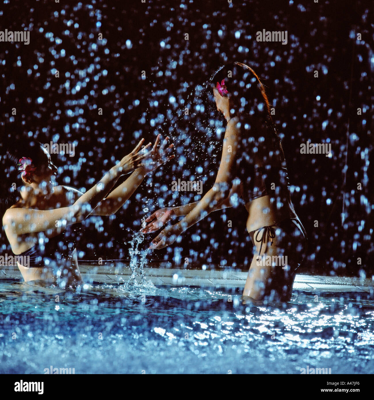 Women in pool hi-res stock photography and images - Alamy