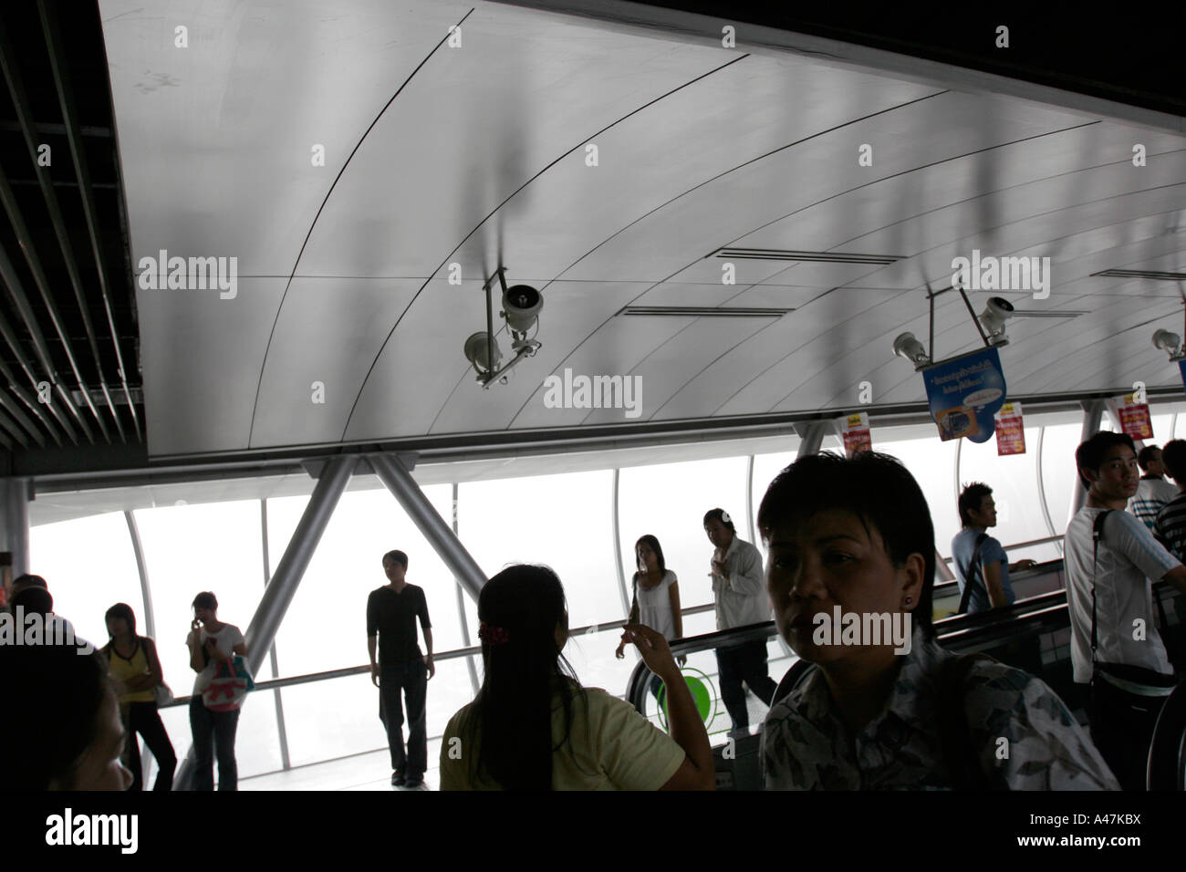 Pedestrians walk through an indoor passage in Bangkok in Thailand Stock ...