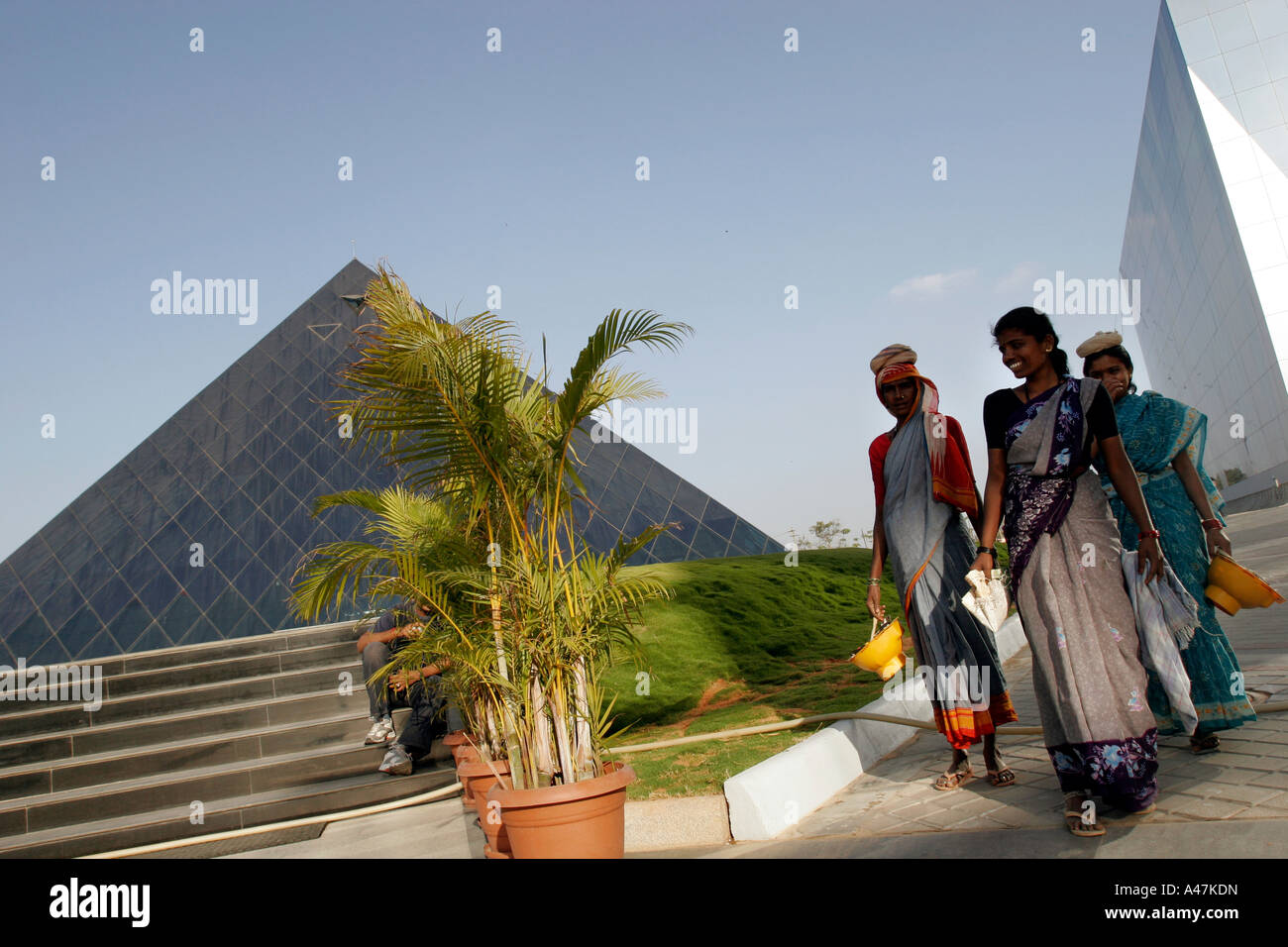 Hired laborers wear traditional Indian clothing at the Infosys Campus in Bangalore in India Stock Photo