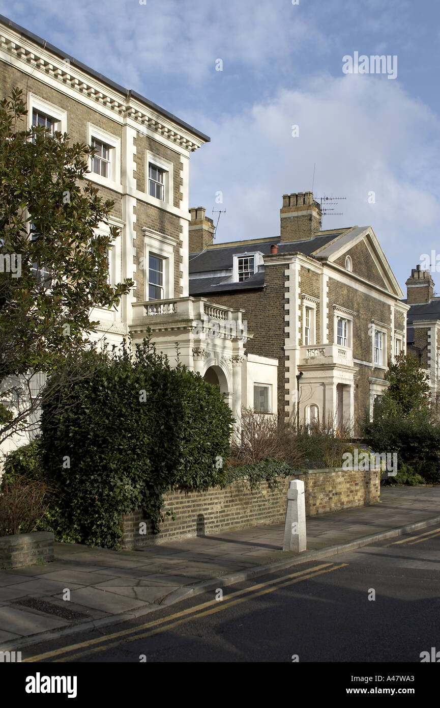 Victorian houses on a street Richmond Green London TW10 Stock
