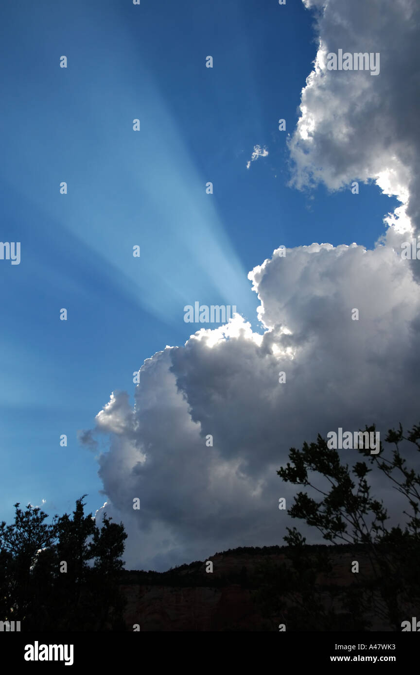 Sun Rays from Behind Clouds Stock Photo - Alamy