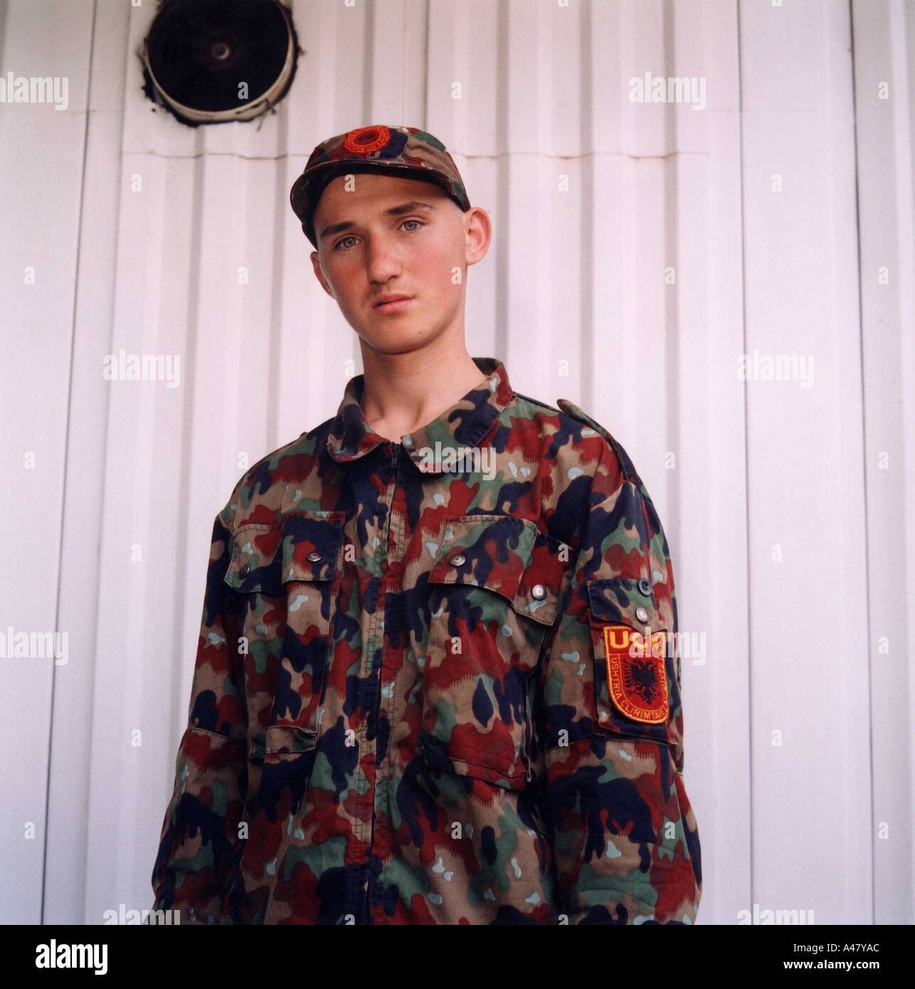 A young Kosovan Liberation Army (UCK) recruit in his new uniform in Tirana, Albania Stock Photo