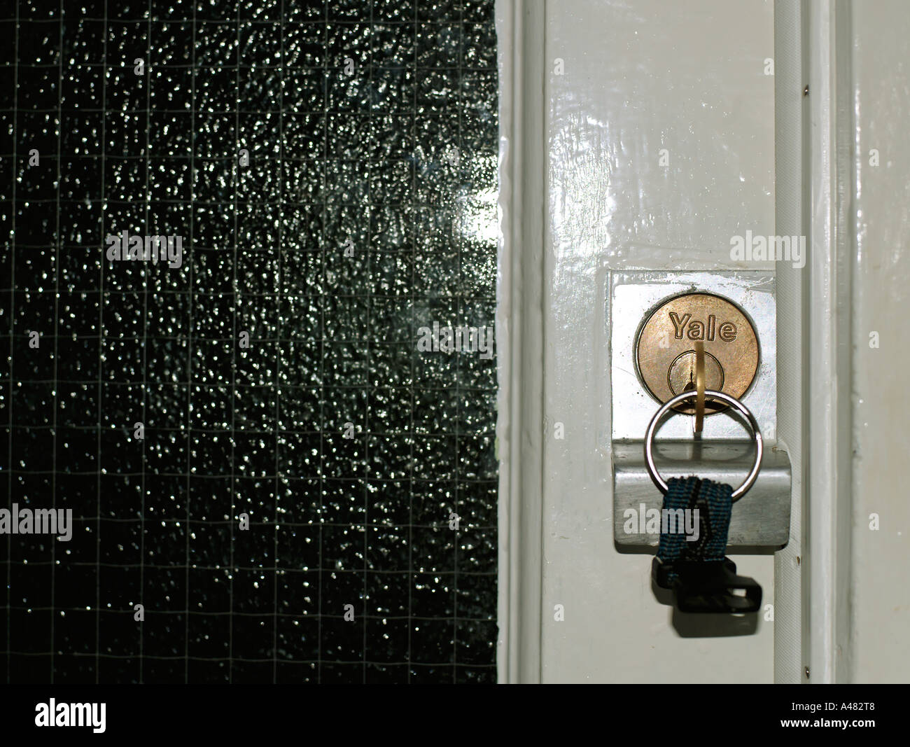 Yale lock in front door Stock Photo Alamy
