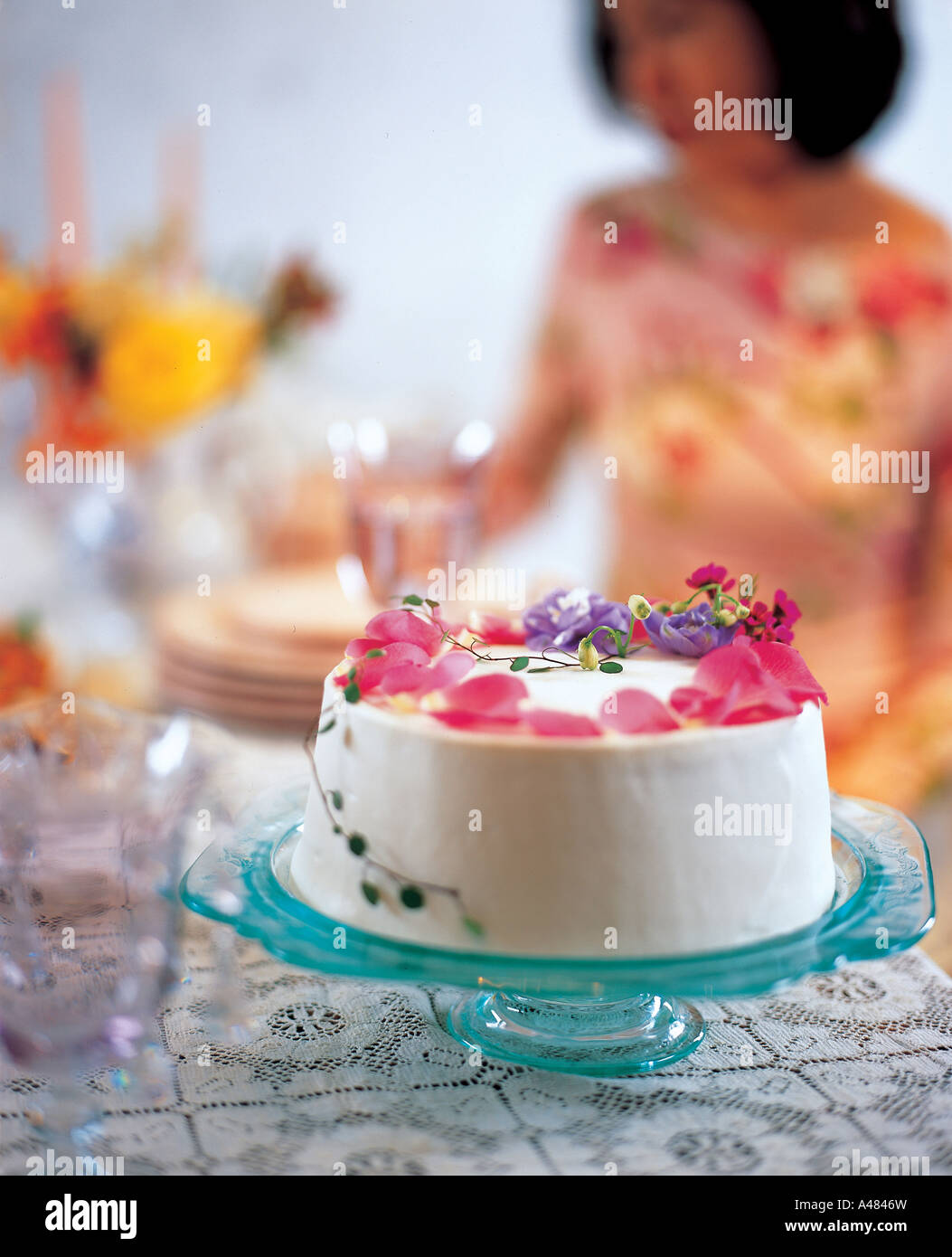 Close-up of a decorated birthday cake on a cake stand Stock Photo - Alamy