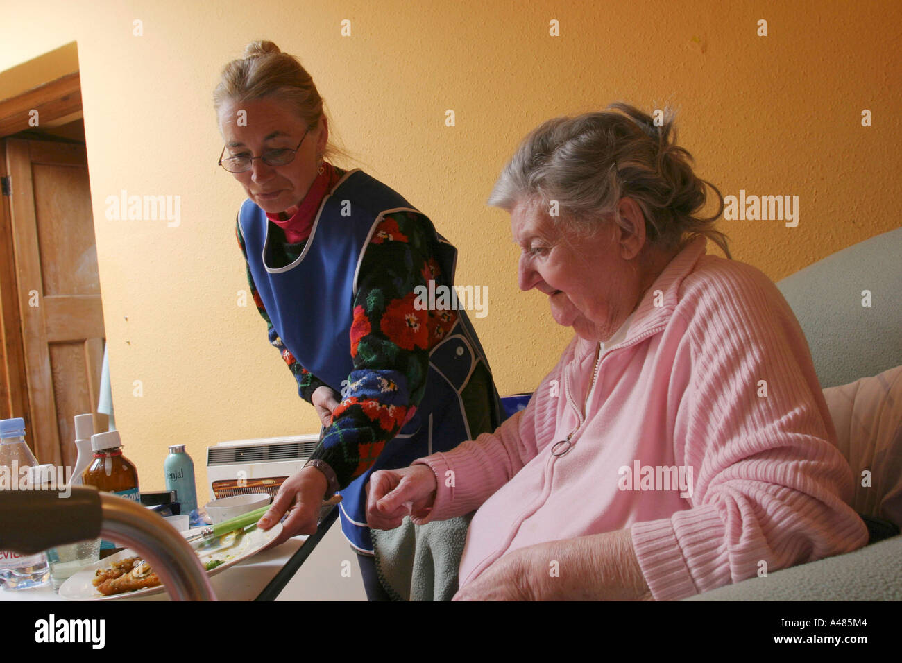 Carer Looking after her Elderly and Ill Mother Health Lifestyle Wales Stock Photo