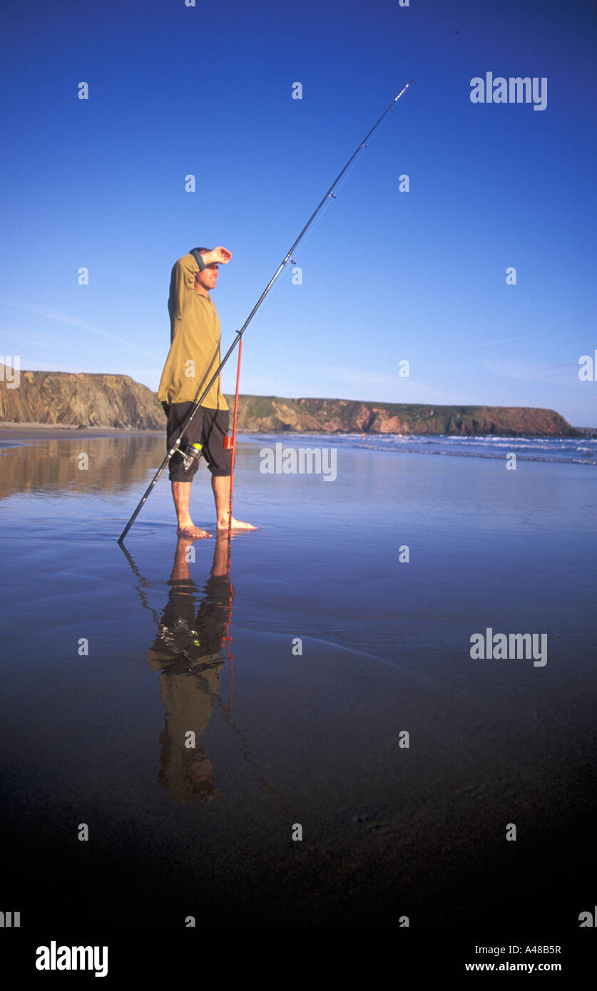 Beach fishing for bass Marloes Sands Pembrokeshire Wales UK Europe