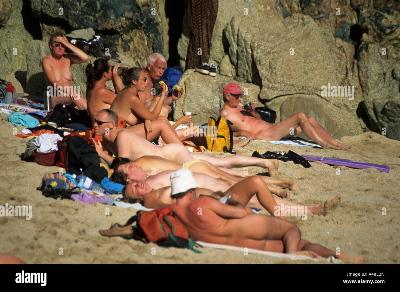 nudists photo  Nudists on beach Porthcurno Cornwall England UK Europe Stock ...