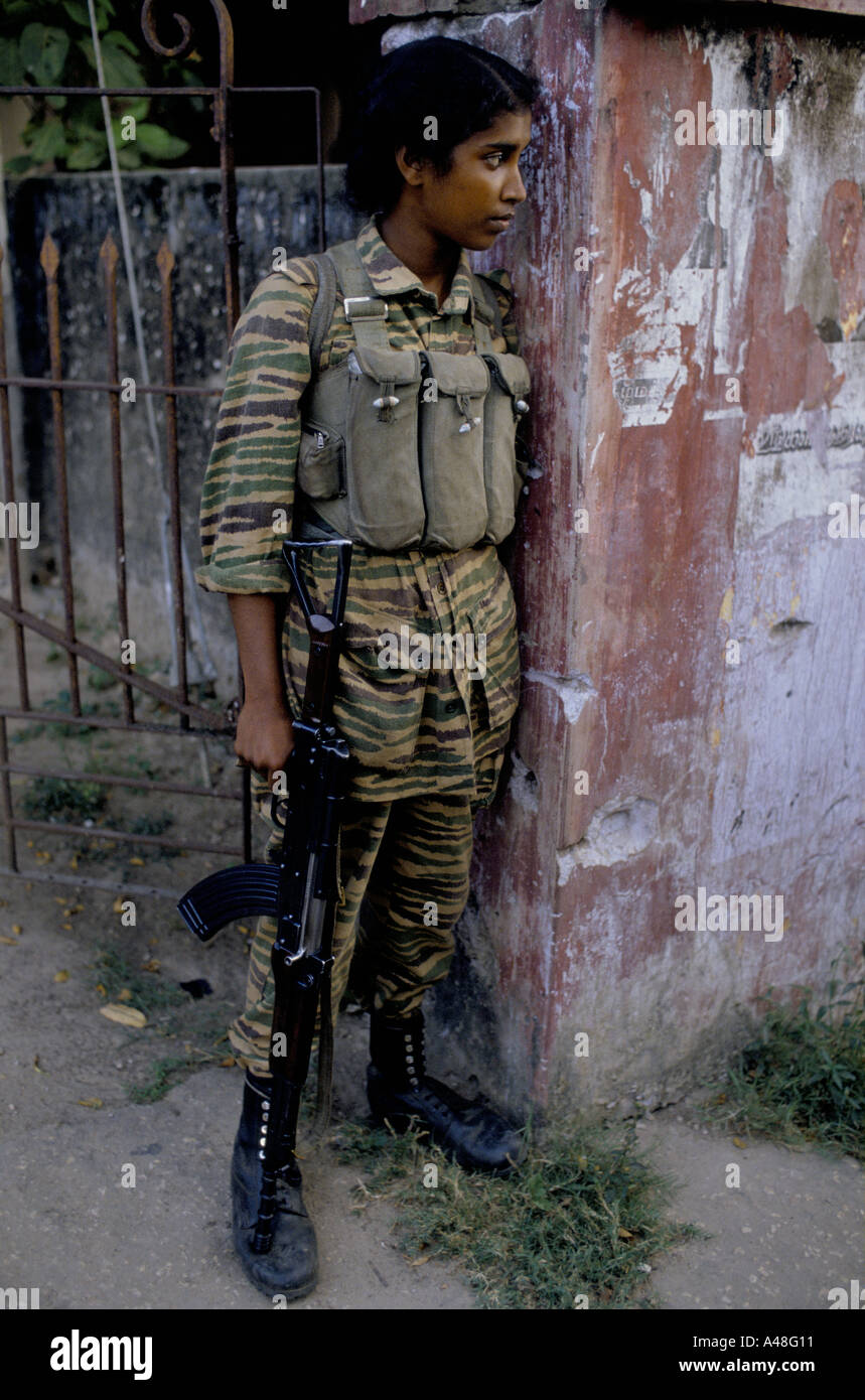 Young girl tamil tiger soldier on guard duty in Jaffna Sri Lanka Stock