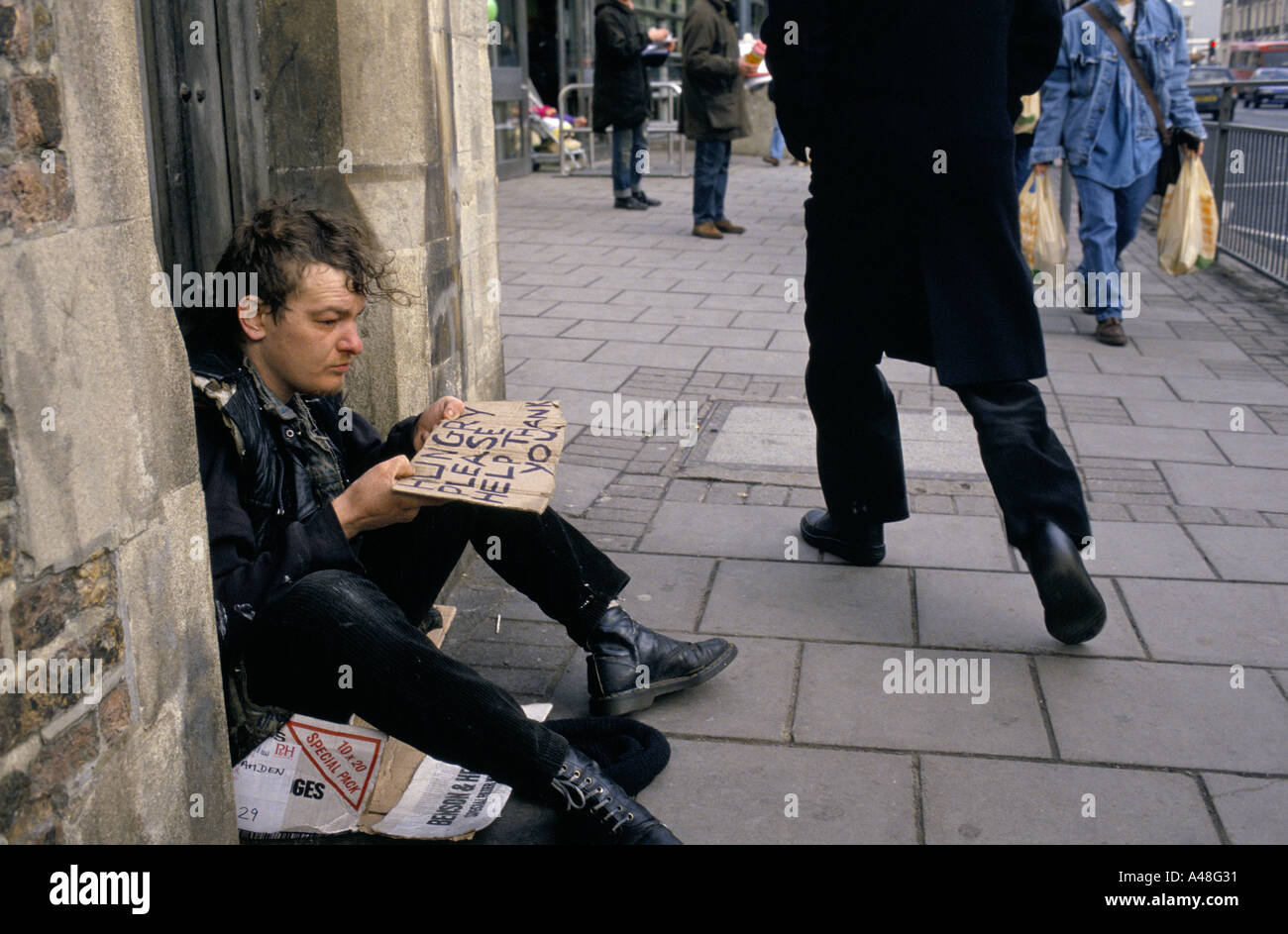 Homeless person beggin...