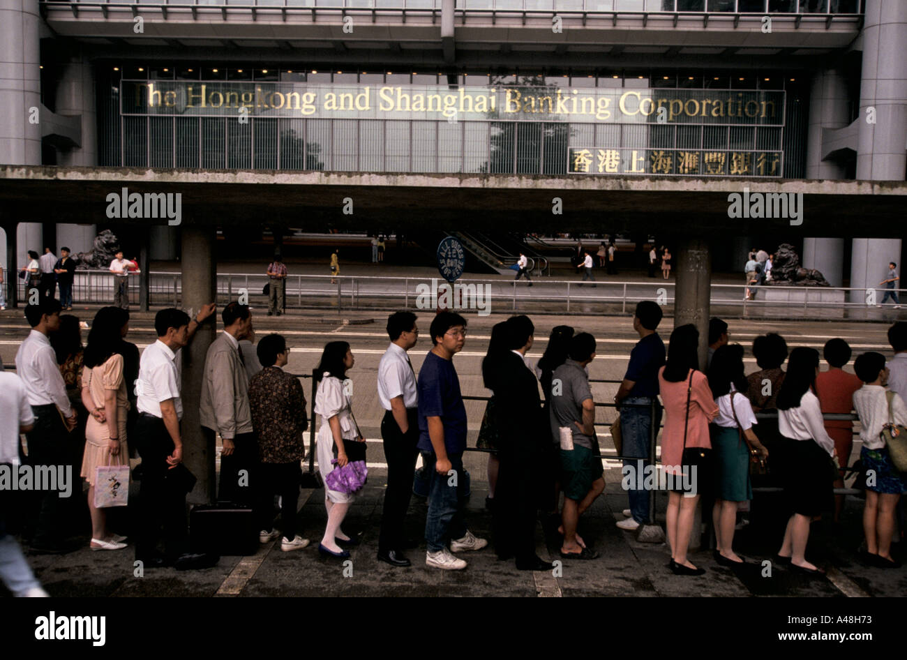 Waiting For A Tram After Work Outside Hong Kong Shanghai Bank Stock Photo Alamy