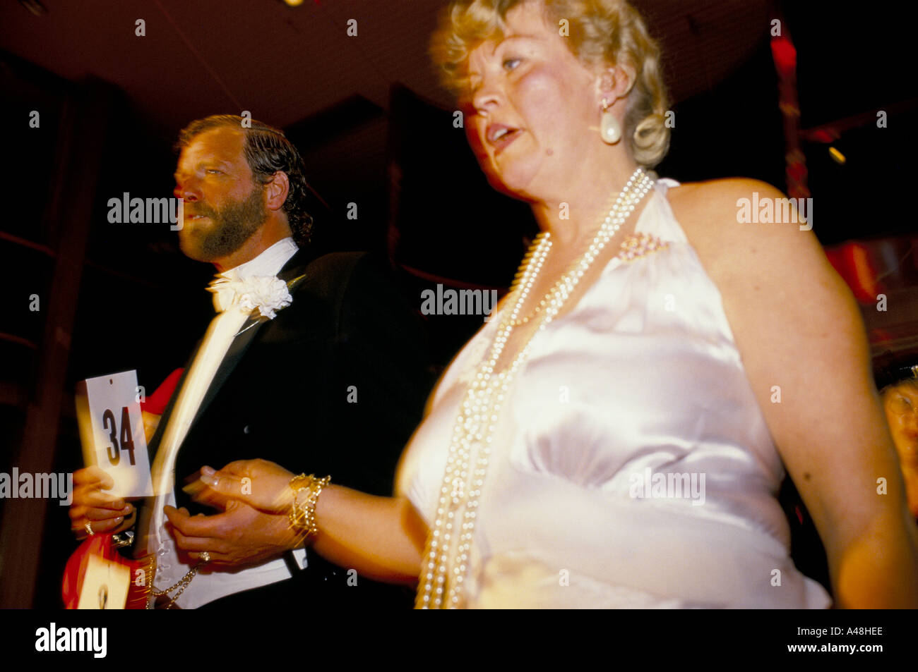 masquerade fancy dress ball on QE2 cruise ship Stock Photo