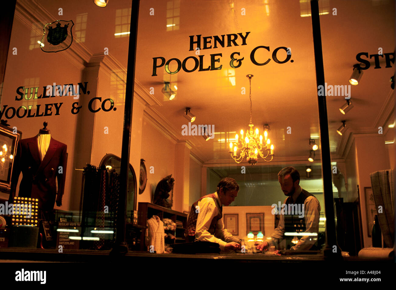 saville row tailor in his shop and workshop Stock Photo