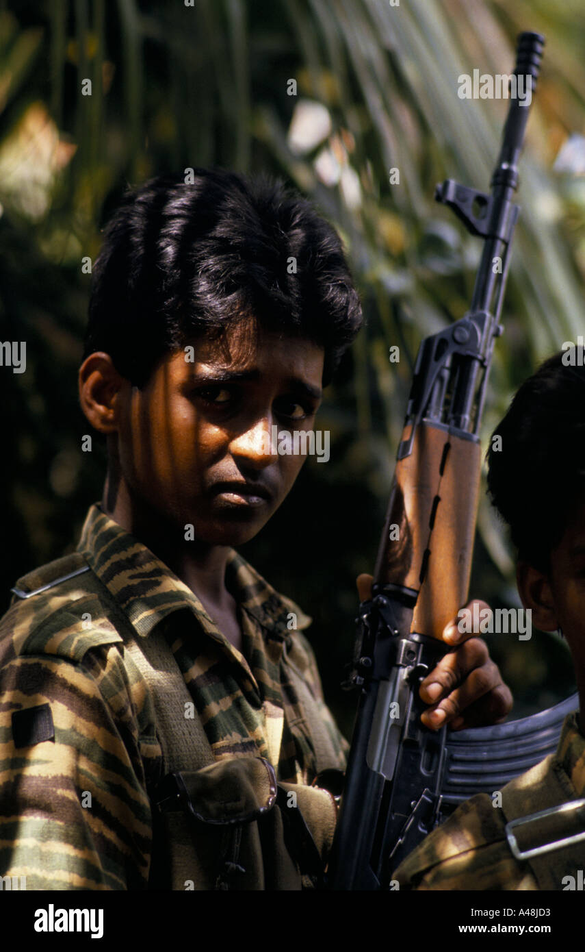A child tamil tiger soldier in the jungle near Jaffna Sri Lanka Stock Photo
