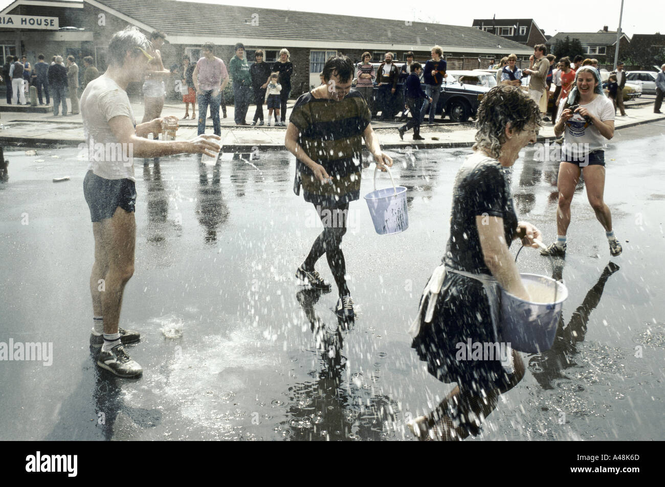 soaking students with buckets of water during charity rag week southampton university Stock Photo