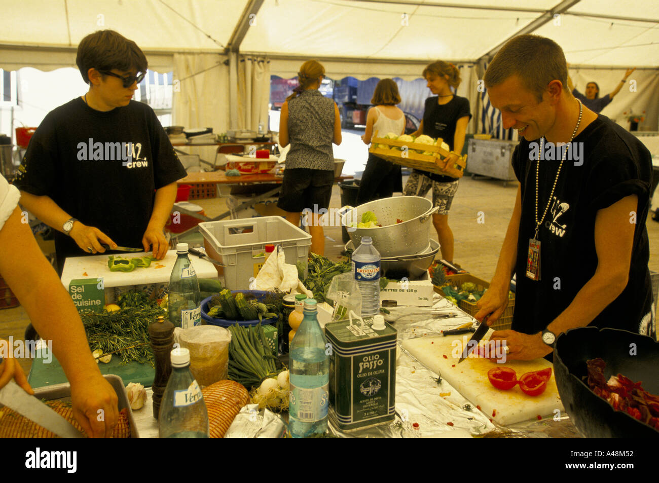 Caterers for pop group U2 preparing food for the road crew riggers and technicians who rig and set up the stage. Stock Photo