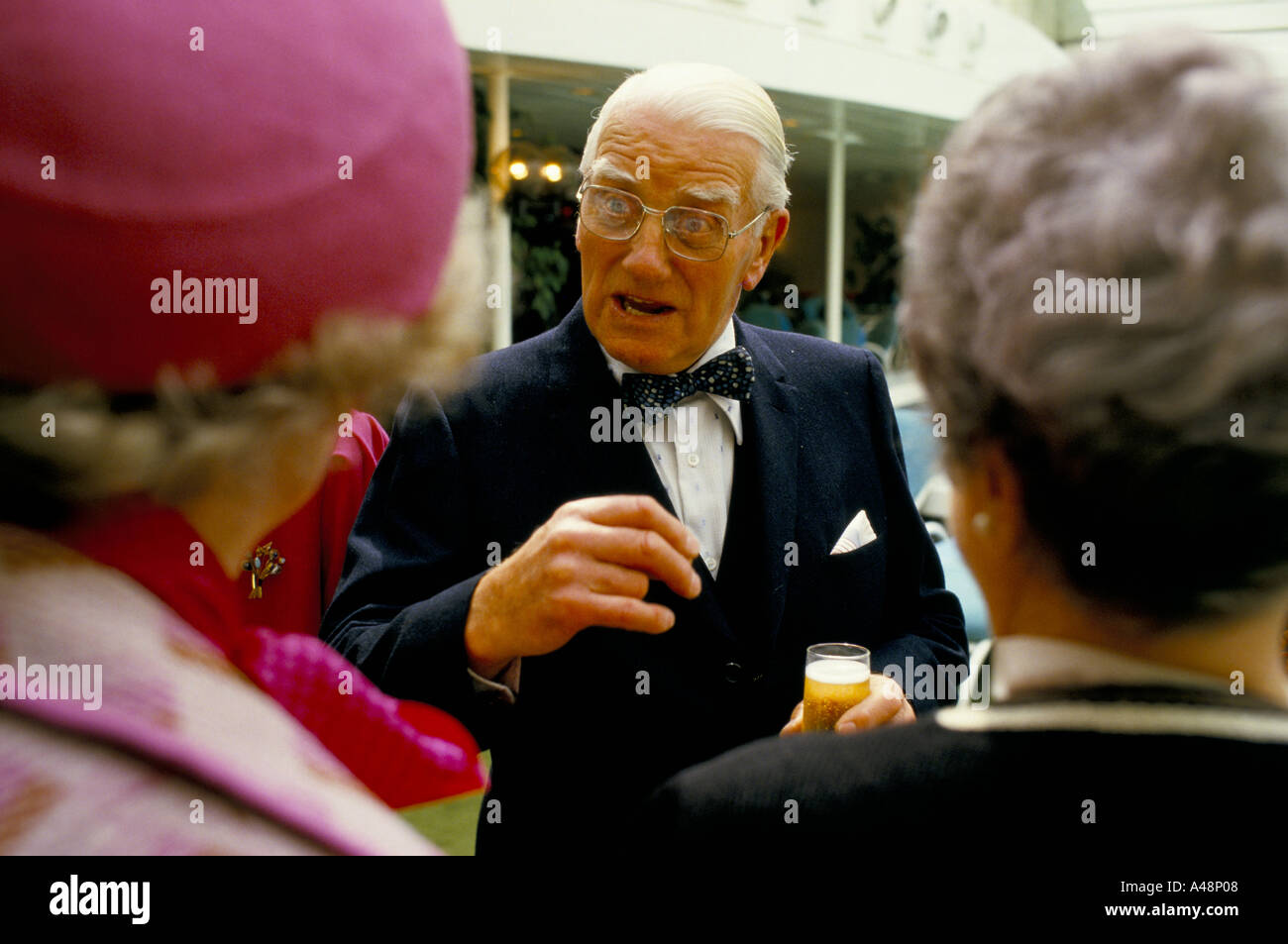 Man meeting the Queen Mother on the QE2 cruise liner  on its trans atlantic anniversary voyage, southampton Stock Photo