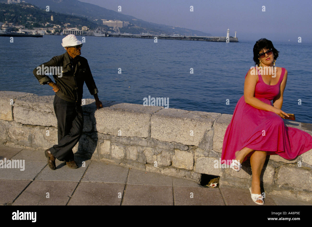 Holidaymakers enjoying the sunshine on yalta seafront .Yalta Crimea Ukraine Stock Photo