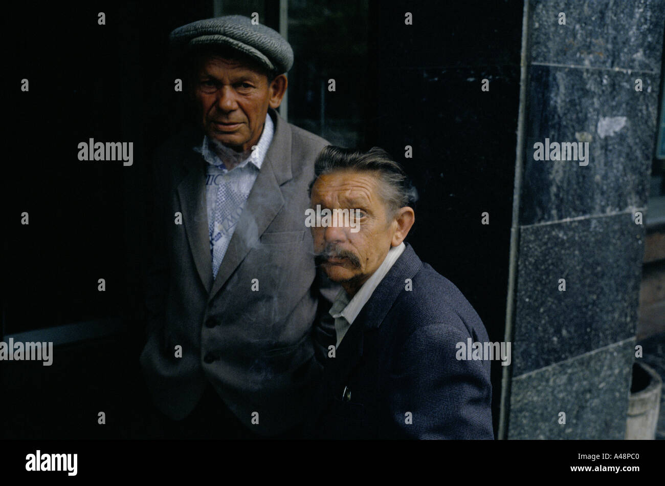 Two men in a doorway in Simferipol main town in  Crimea Stock Photo