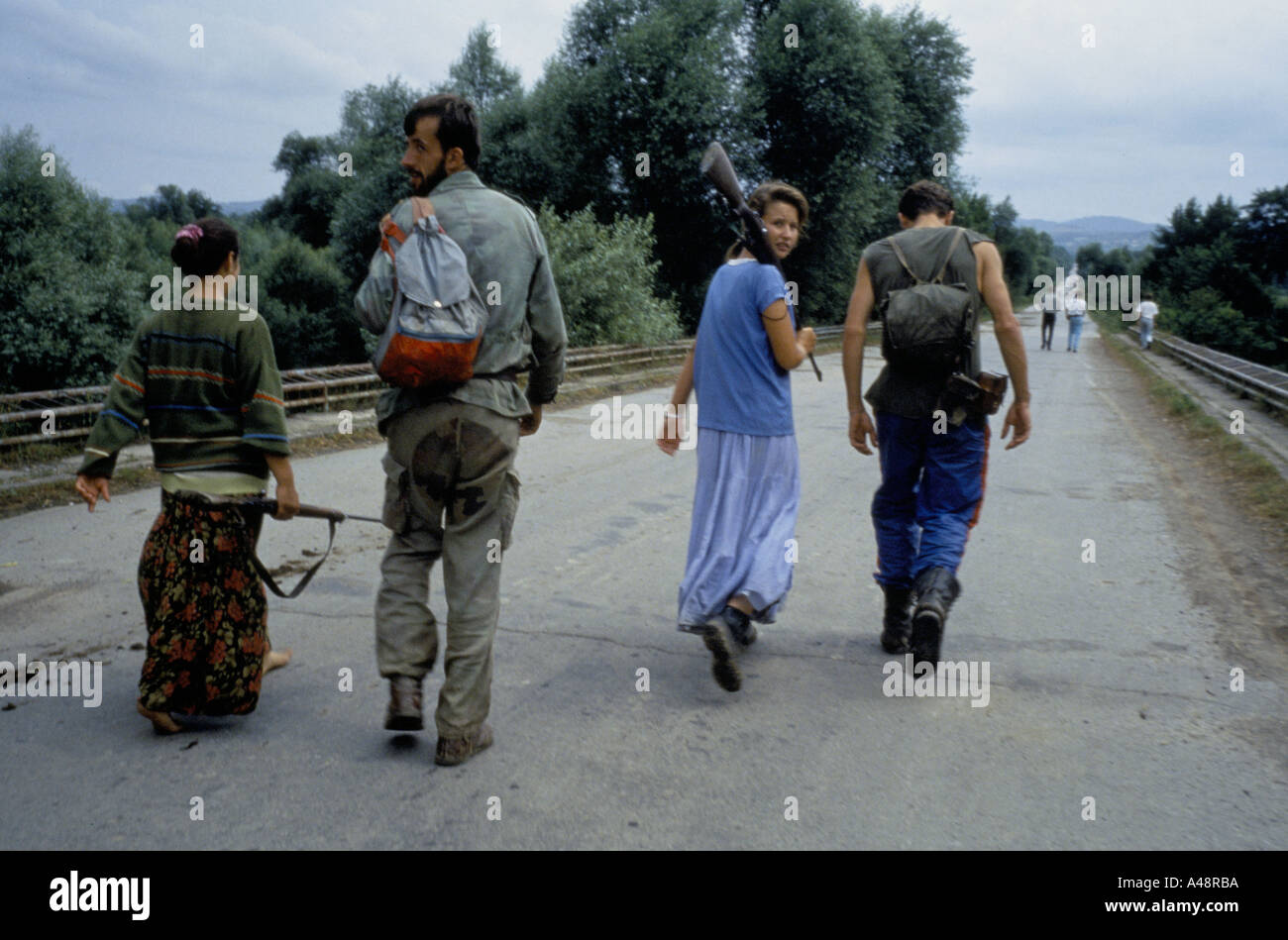 The first men and women fighters arrive in Tuzla from Srebrenica after fighting their way through Serb lines Stock Photo