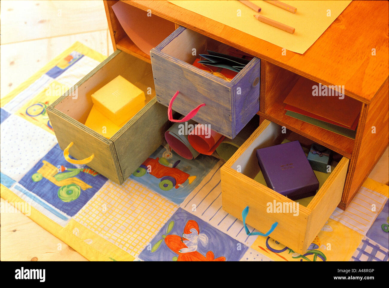 High angle view of the open drawers of a table Stock Photo - Alamy