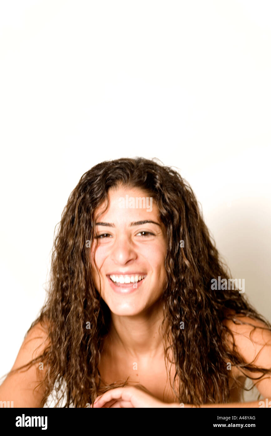 Young woman beautiful curly hi-res stock photography and images - Alamy