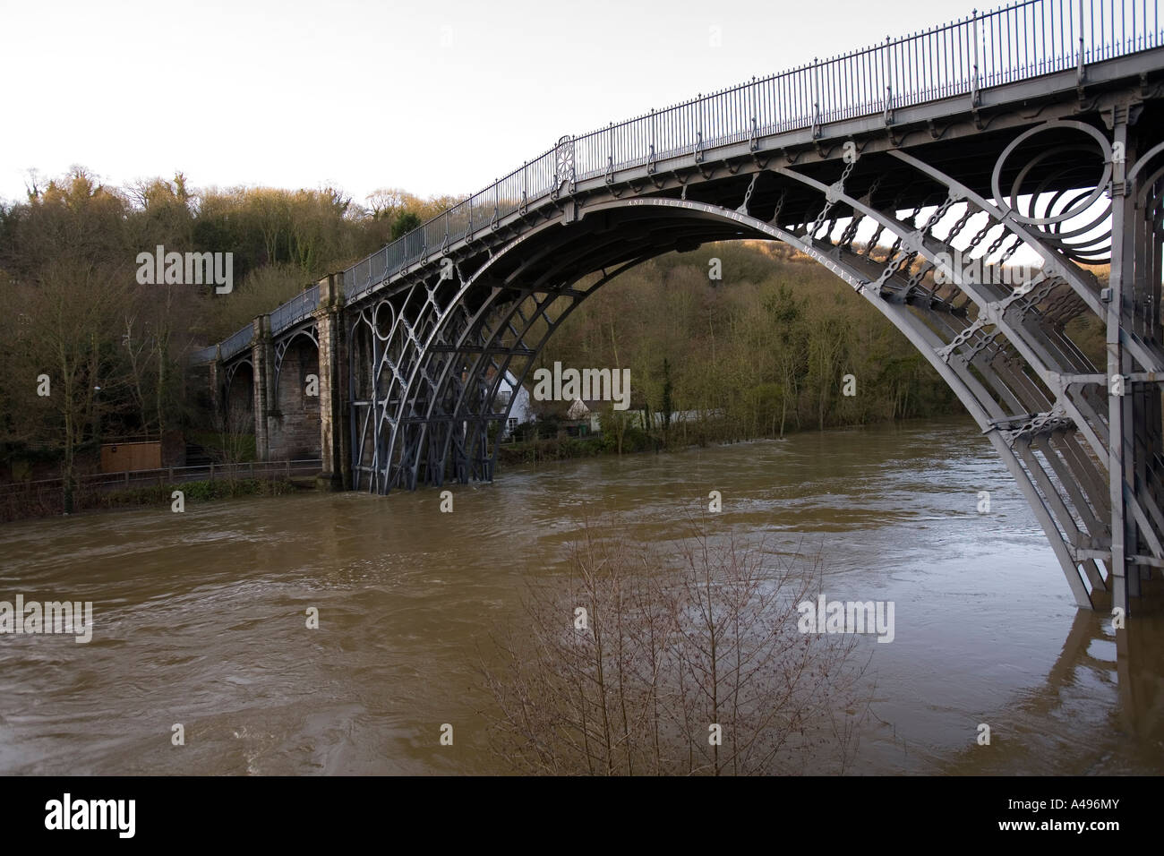 UK Shropshire Ironbridge flooding River Severn in flood threatening Thomas Telfords landmark bridge Stock Photo