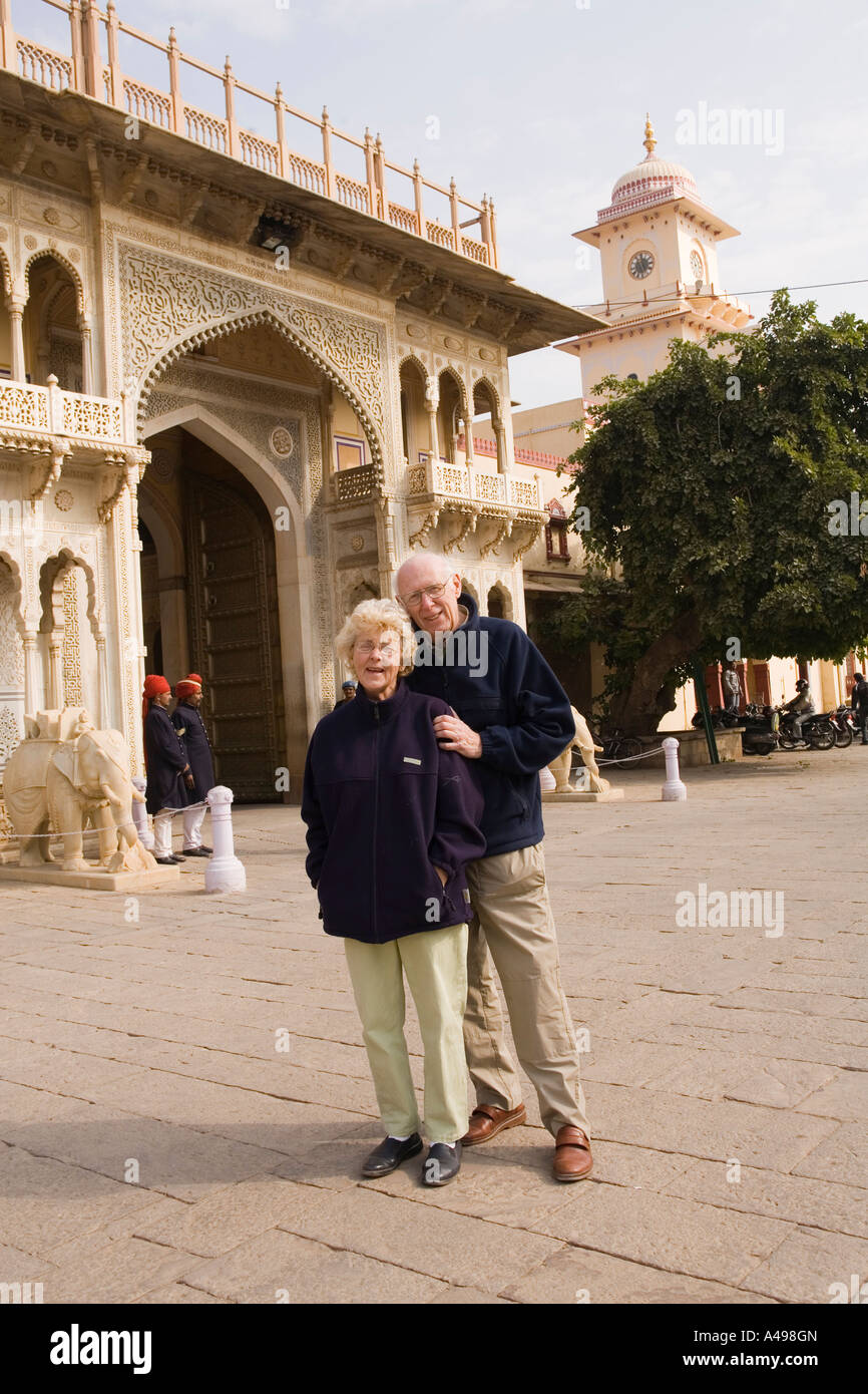 India Rajasthan Jaipur City Palace older western visitors at entrance archway Stock Photo