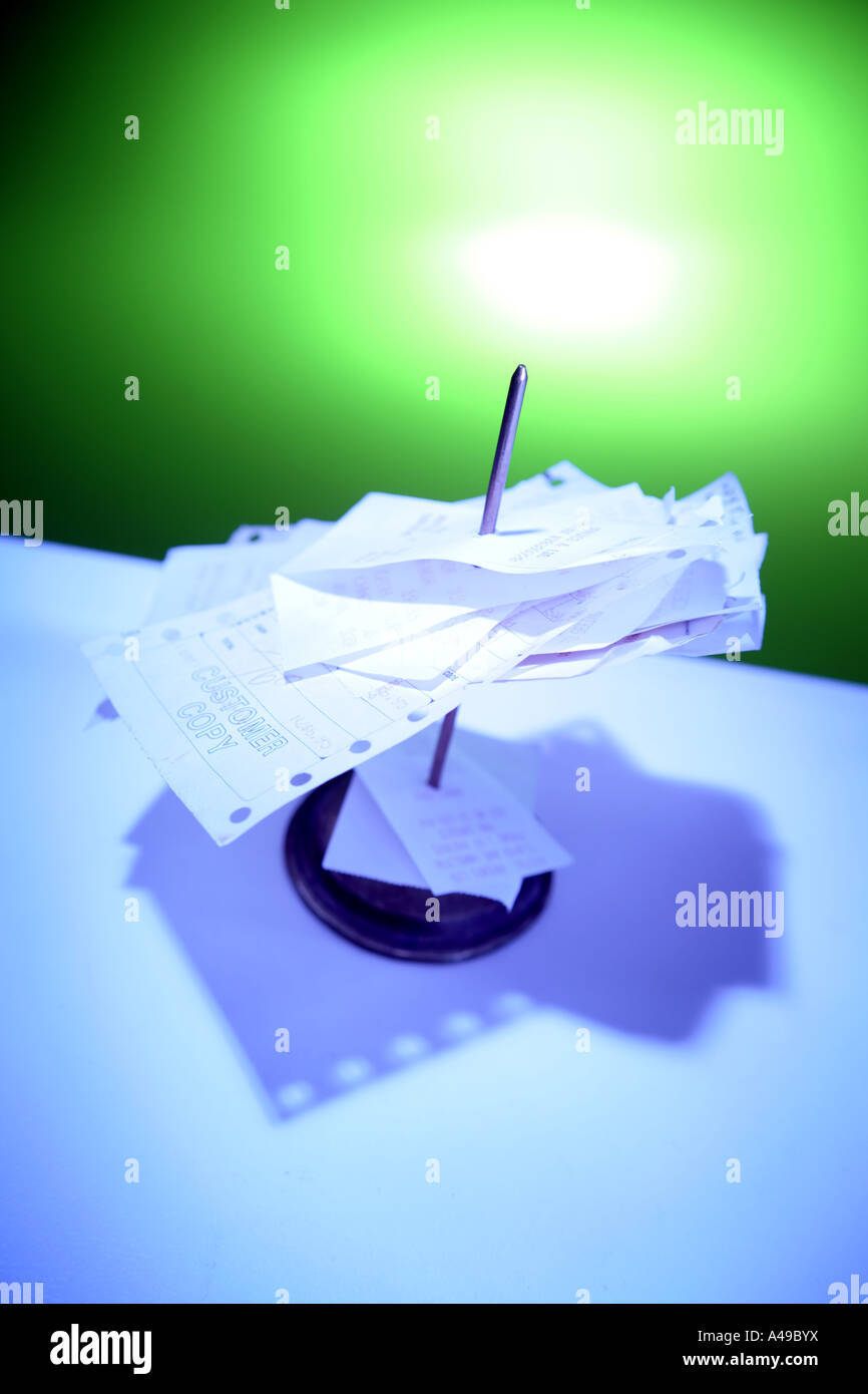 Receipts on spike Stock Photo Alamy