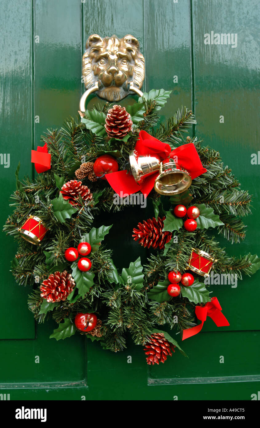 Christmas decorations on a front door in the UK Stock Photo - Alamy