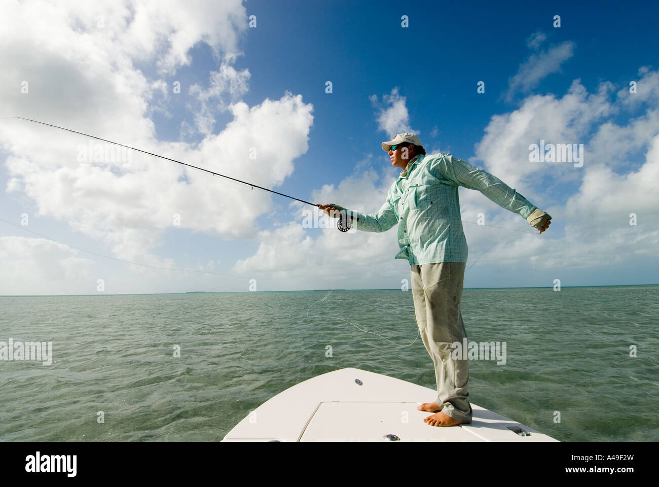 USA Florida Keys Fisherman fly fishing from boat in salt water