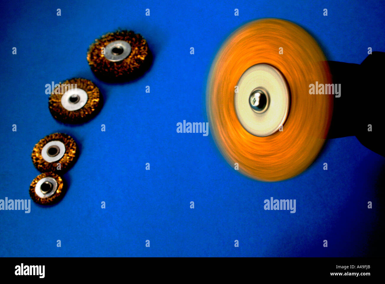 wire brush spinning on electric drill Stock Photo Alamy