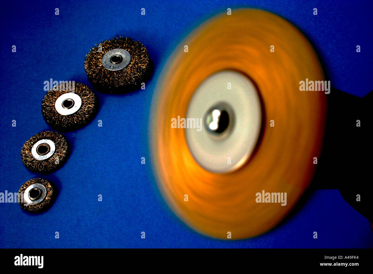 wire brush spinning on electric drill Stock Photo Alamy