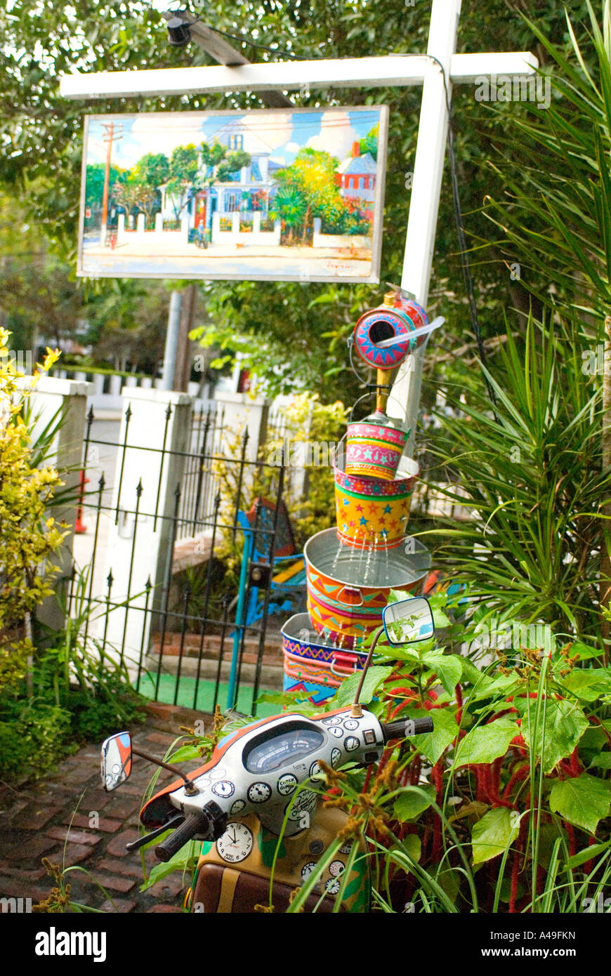 USA Florida Keys Colorful arrangement of water tubs and greeny at B & B Hotel Key West Stock Photo