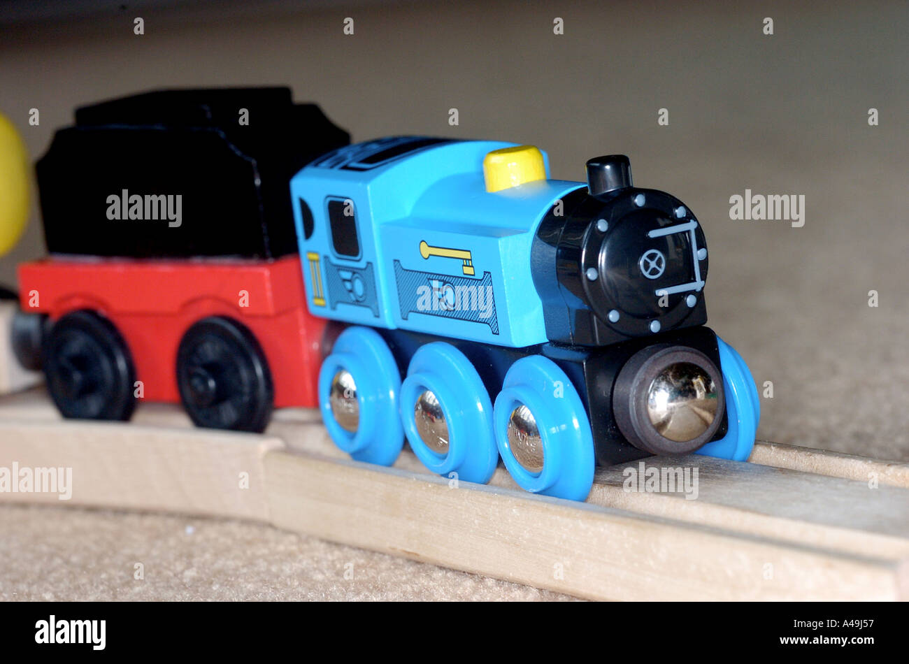 A child s wooden train set Stock Photo Alamy