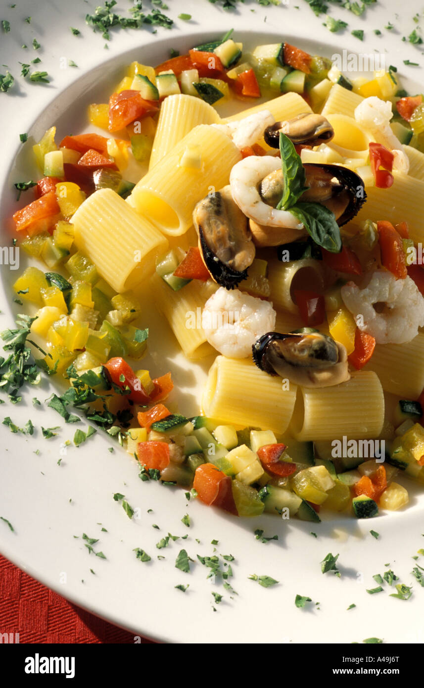 Mezze Maniche pasta with vegetables mussels and shrimps Il Tramonto restaurant Ponza island Lazio Italy Stock Photo