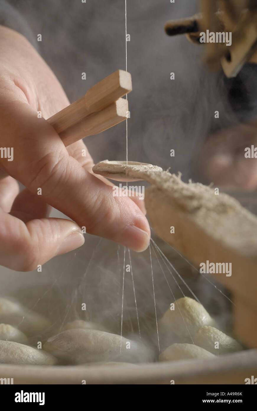 Pulling silk hi-res stock photography and images - Alamy
