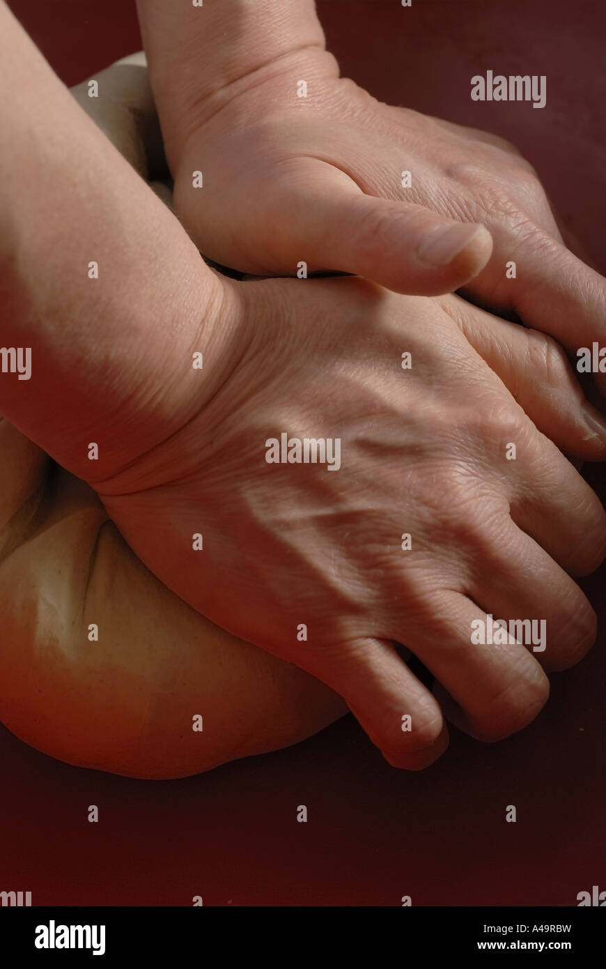 Close up of a person s hands kneading dough Stock Photo - Alamy