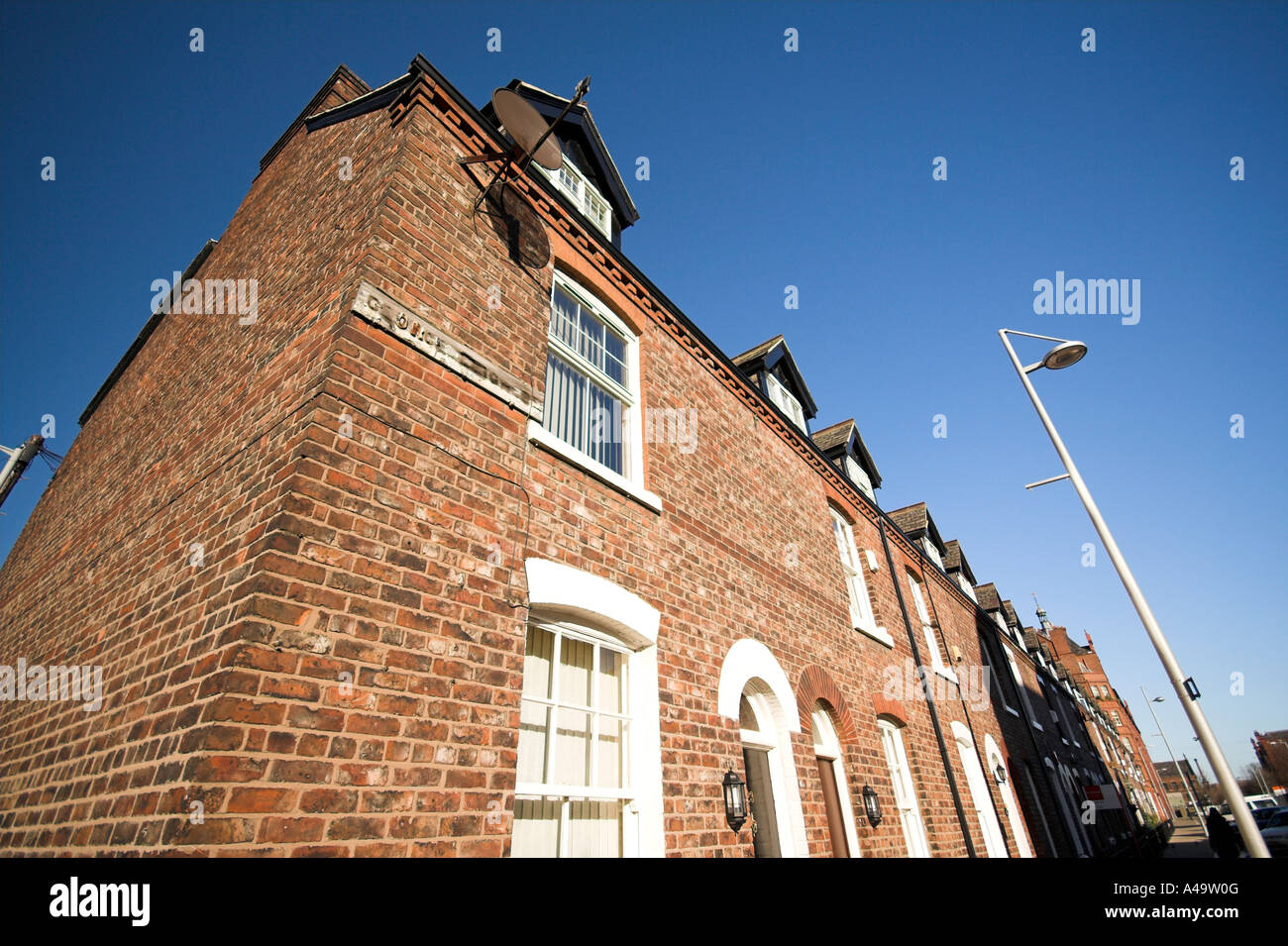 Terraced housing, Leigh Street, Ancoats, Manchester, UK Stock