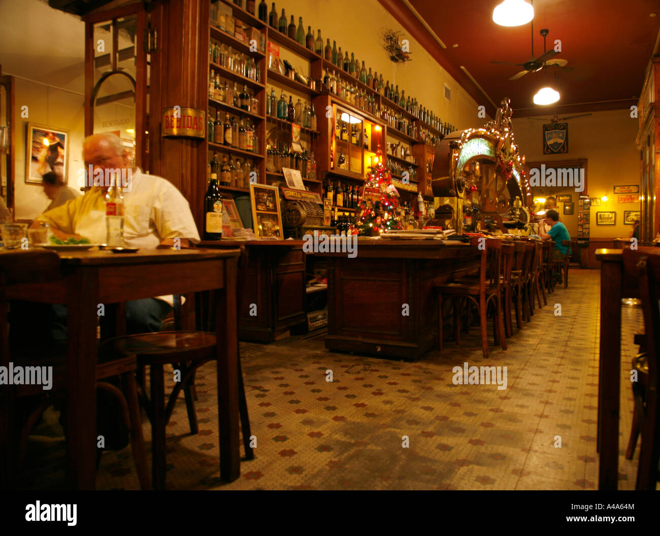 Man at bar on stool hi-res stock photography and images - Alamy