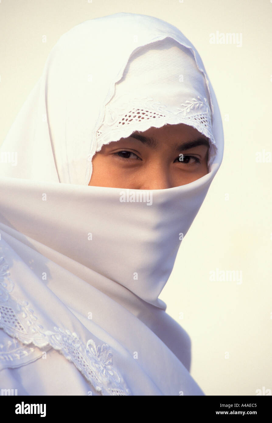 Young Javanese girl in traditional muslim dress Yogyakarta Java ...