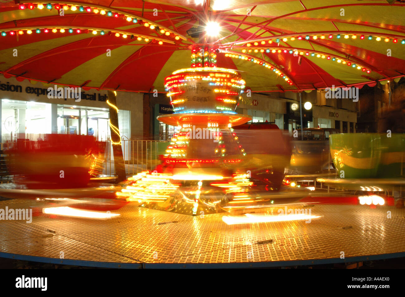 christmas fairground ride at night, York, England, UK Stock Photo