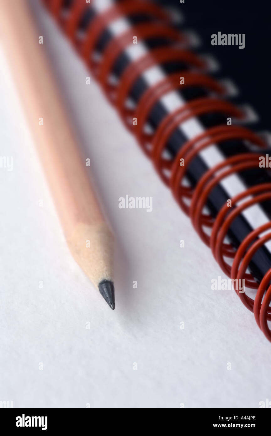 A Close Up Of A Pencil And Black Note Book Pad On A Plain White Background Stock Photo Alamy A Close Up Of A Pencil And Black Note Book Pad On A Plain White Background Stock Photo Alamy